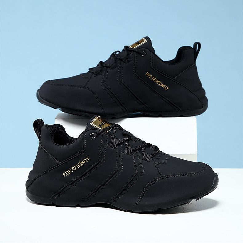 Pure black arch support sneakers