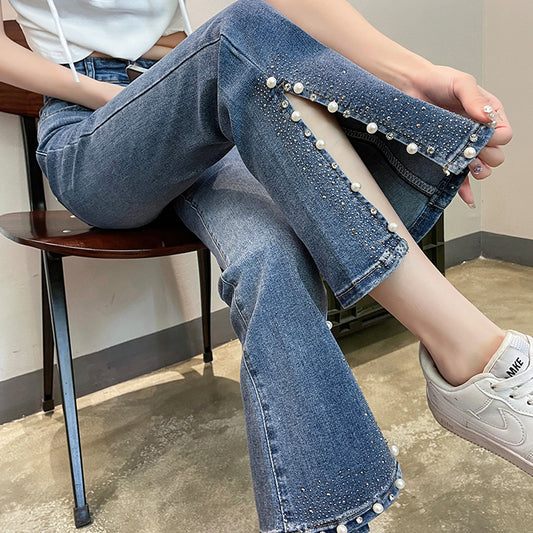 Pearl rhinestone slit stretch-denim jeans
